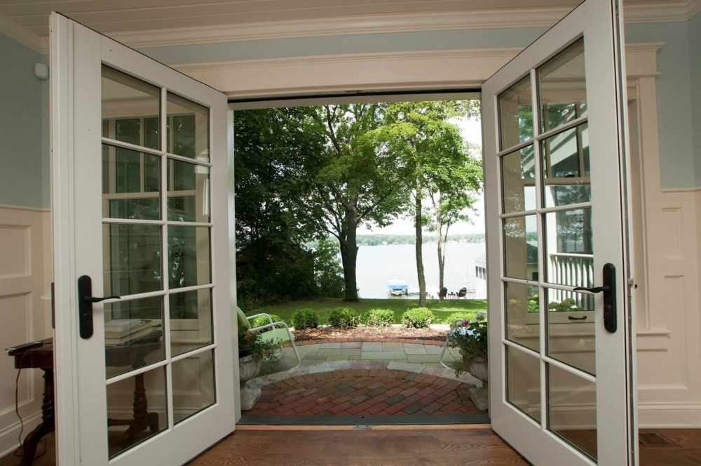 Lake Geneva French Door Installation provides beautiful all glass doors leading to patio on the lake Lake Geneva French Door Installation